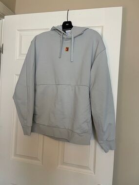 Nike Light Gray Pullover Hoodie with Subtle Logo